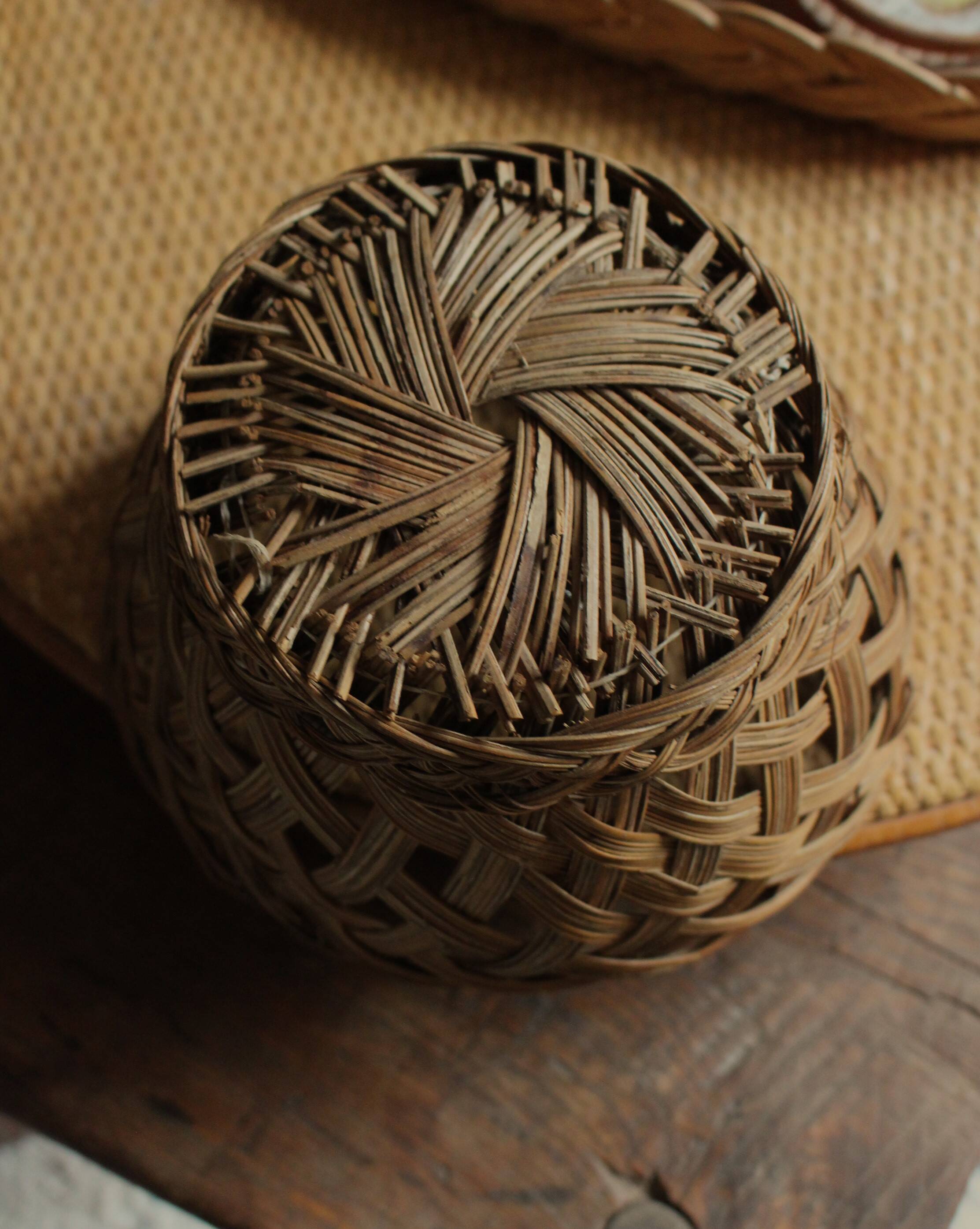 Small tall vintage openwork wicker basket