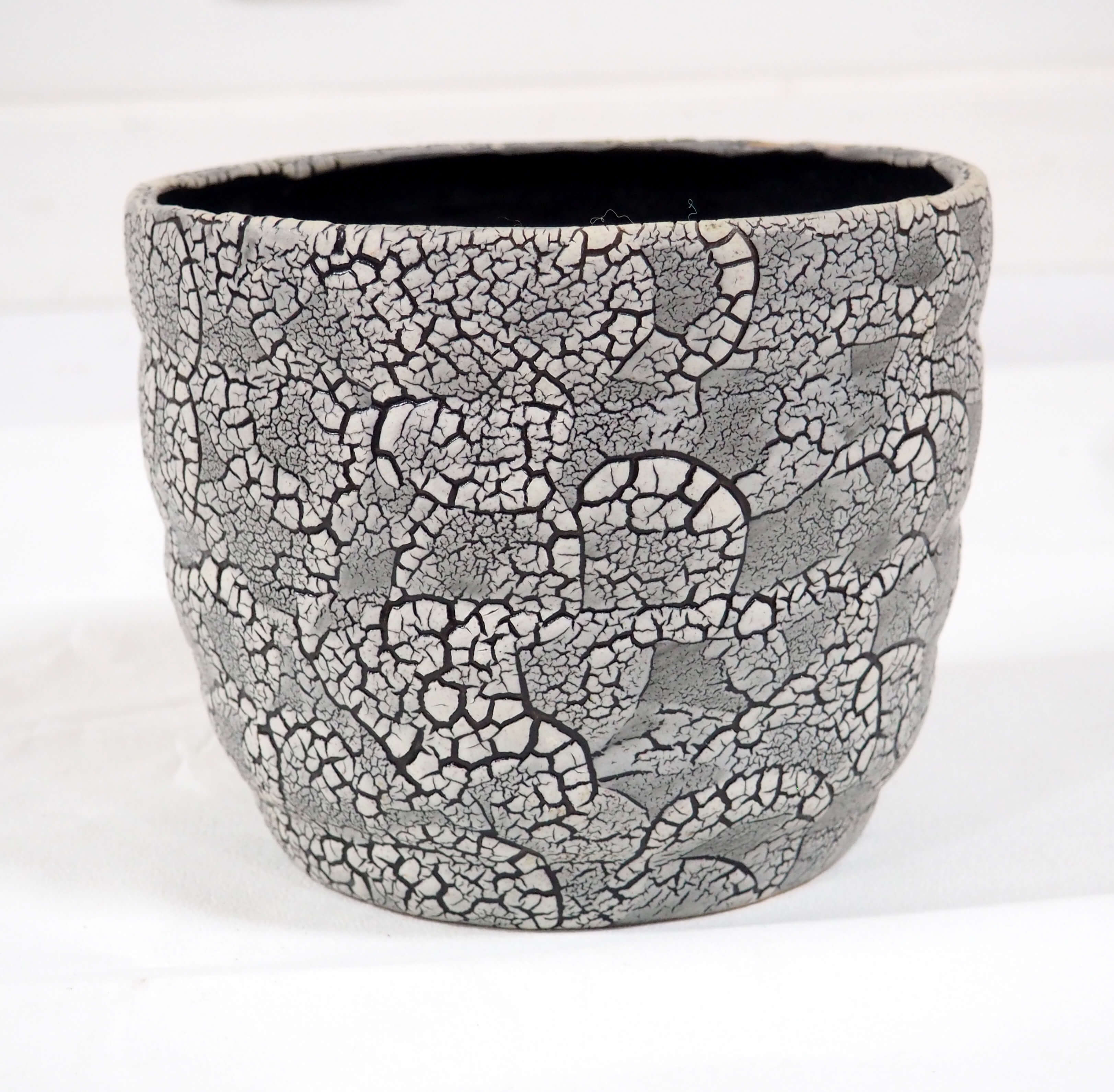 Black earthenware pot cover