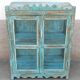 Blue wooden showcase