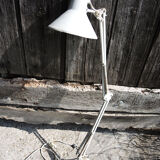 Old articulated workshop lamp in painted metal