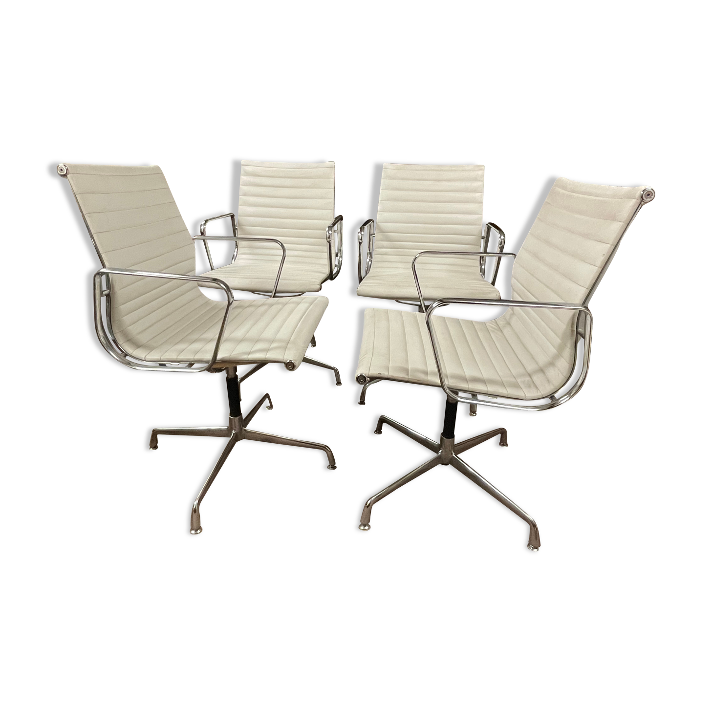 Suite of 4 armchairs in white Ray and Charles Eames leather