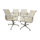 Suite de 4 fauteuils en cuir blanc Ray et Charles Eames