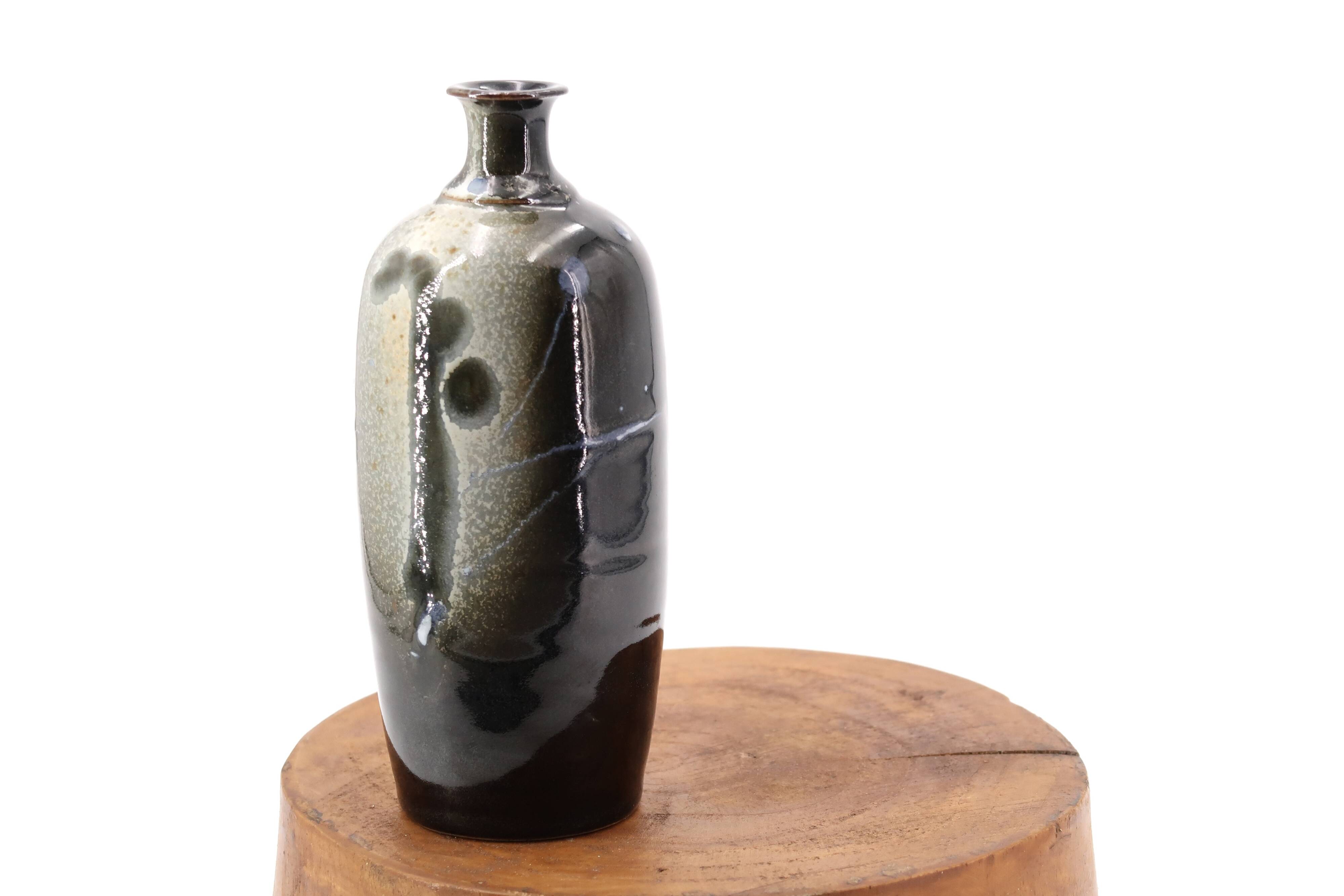Black bottle vase signed in ceramic, abstract decoration