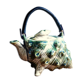 Individual teapot in the shape of a ceramic shell