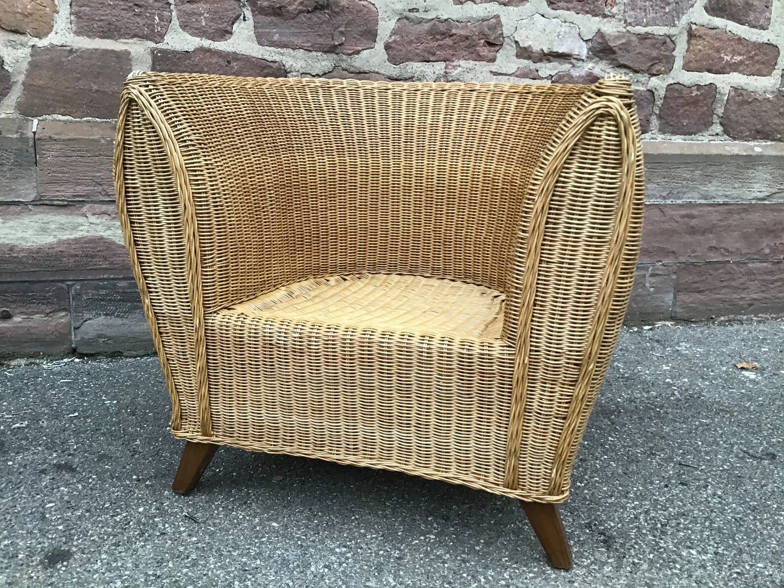 Vintage gondola chair in rattan