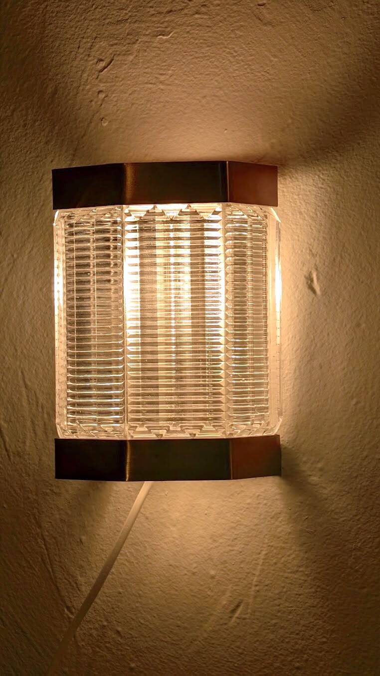 Scandinavian wall lights in copper and pressed glass