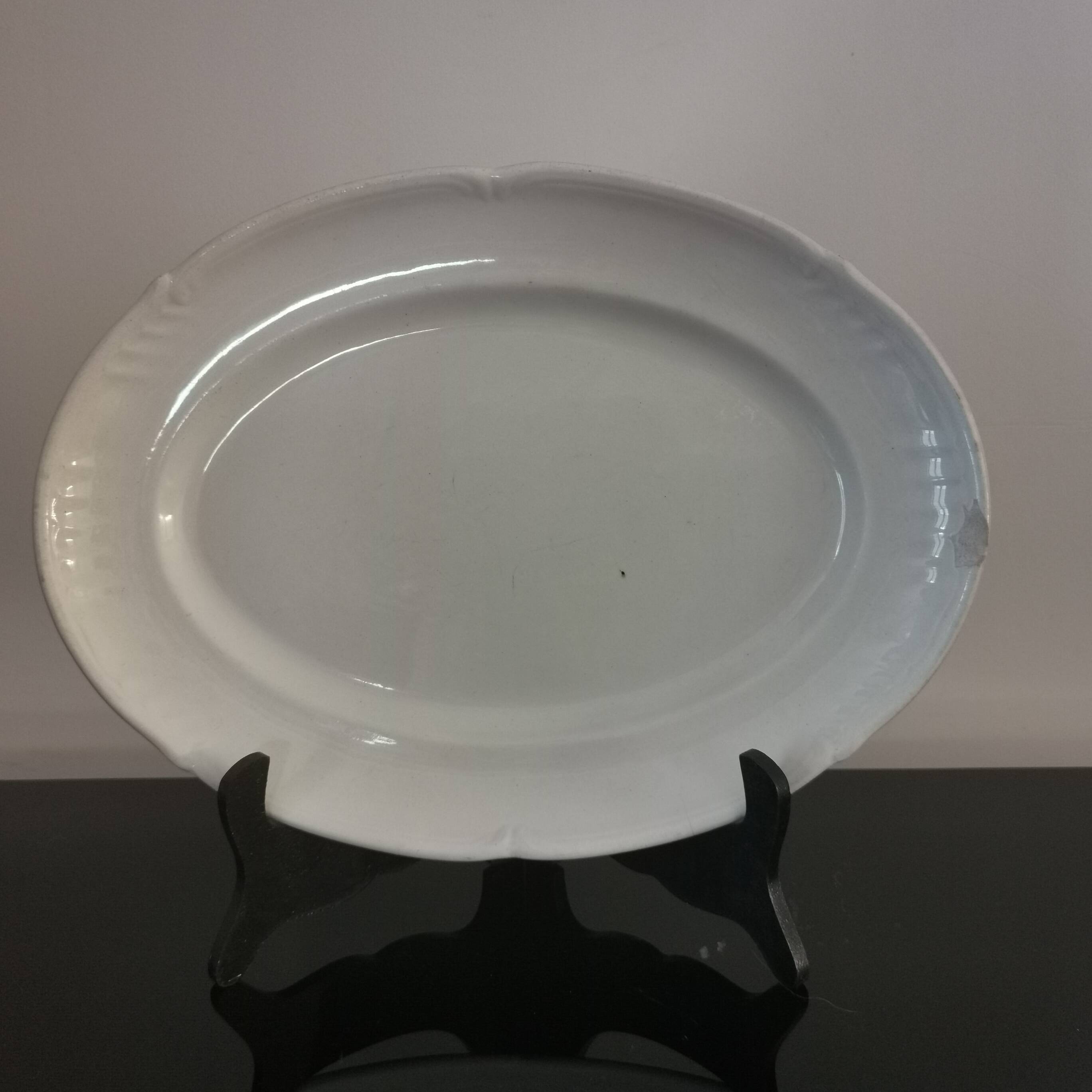 Oval white earthenware dish stamped K&G, Lunéville