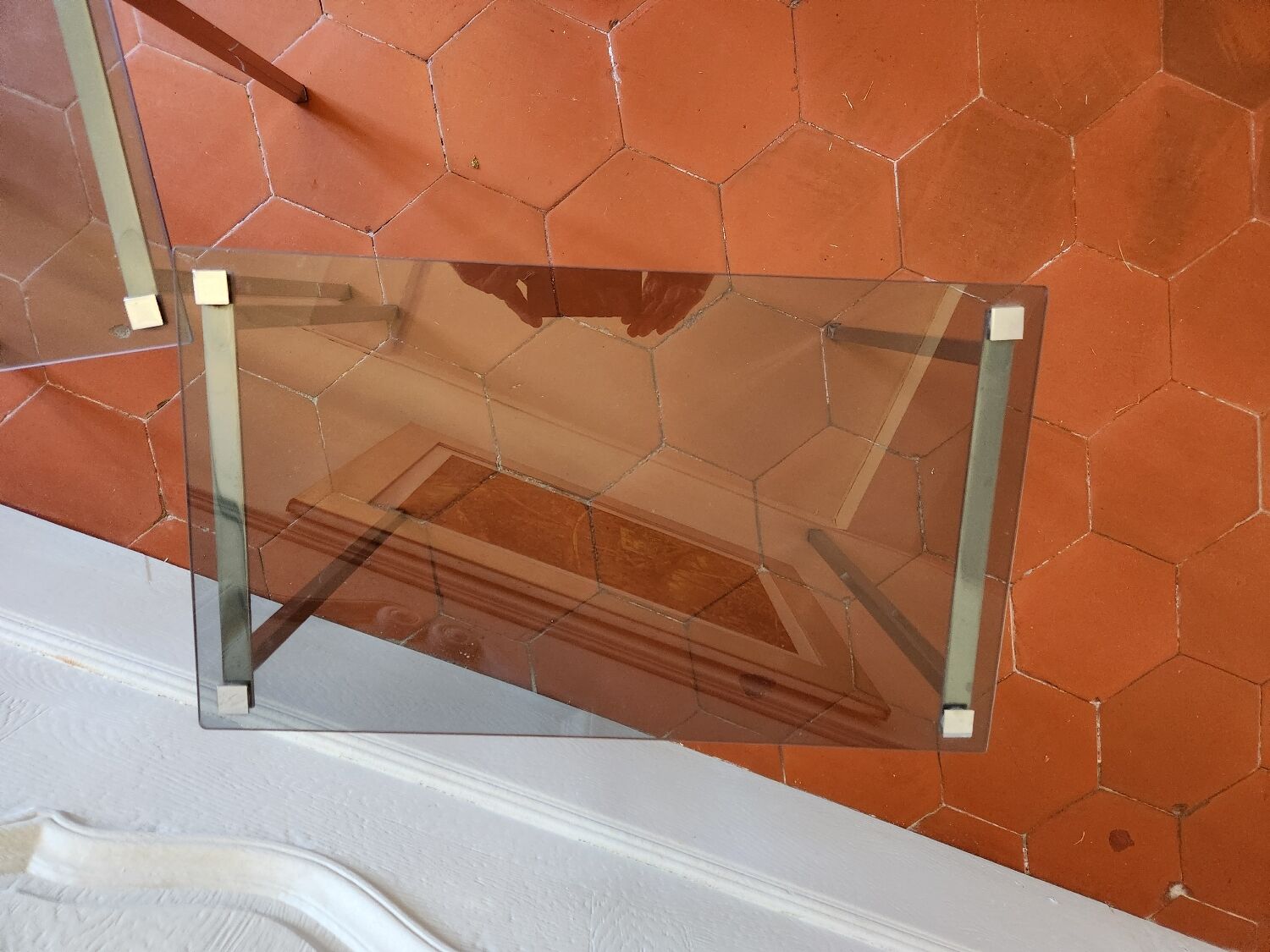 3 nesting tables from the 1970s in smoked glass.
