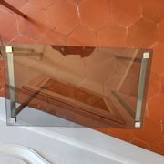 3 nesting tables from the 1970s in smoked glass.
