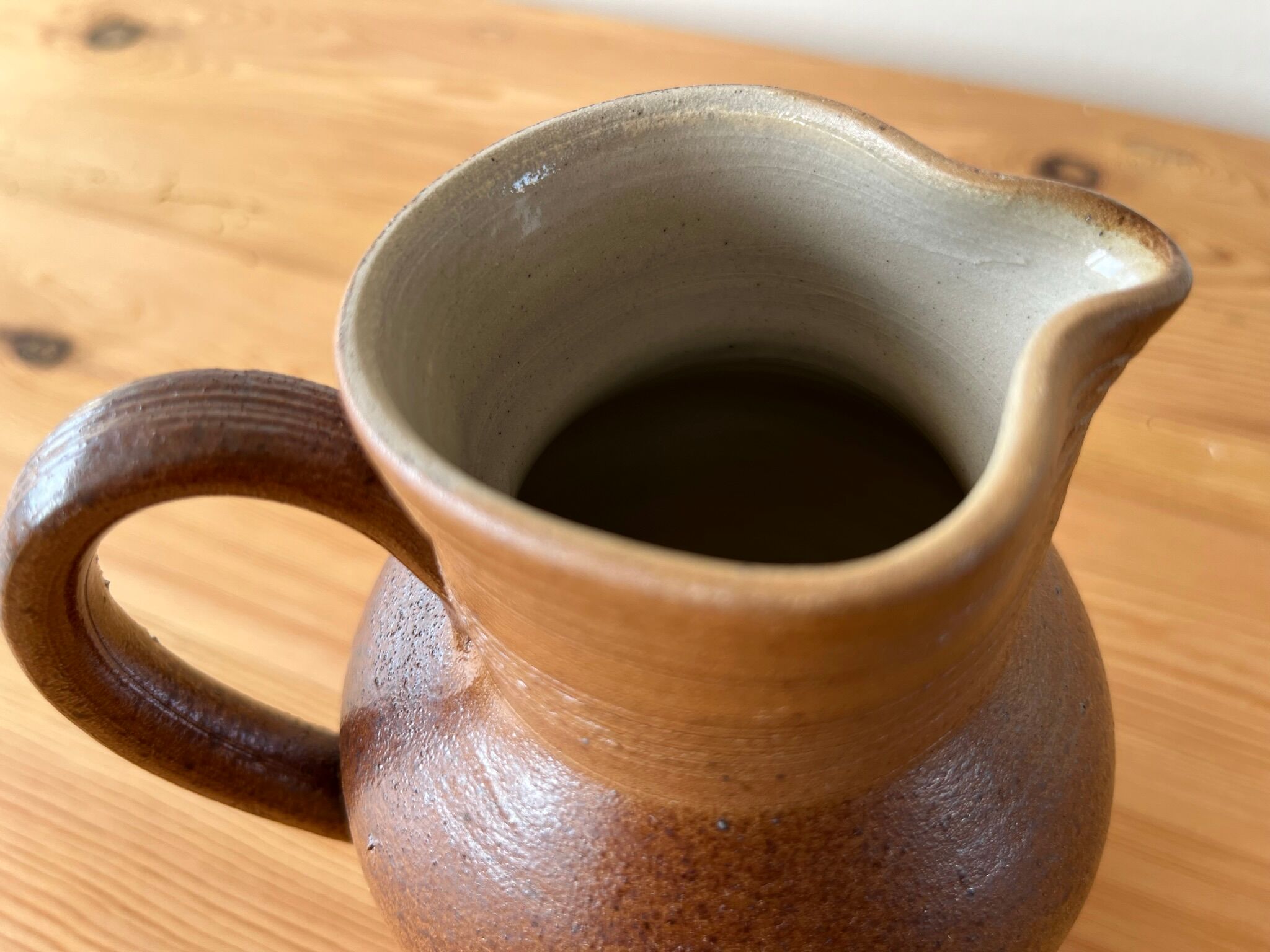 Pitcher in glazed sandstone