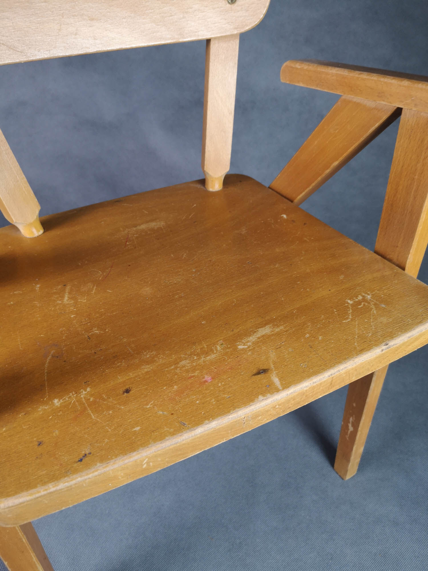 Vintage armchair child feet compass light wood