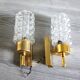 Pair of vintage wall sconces in gilded brass with moulded glass.