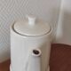 Small coffee maker with floral decoration