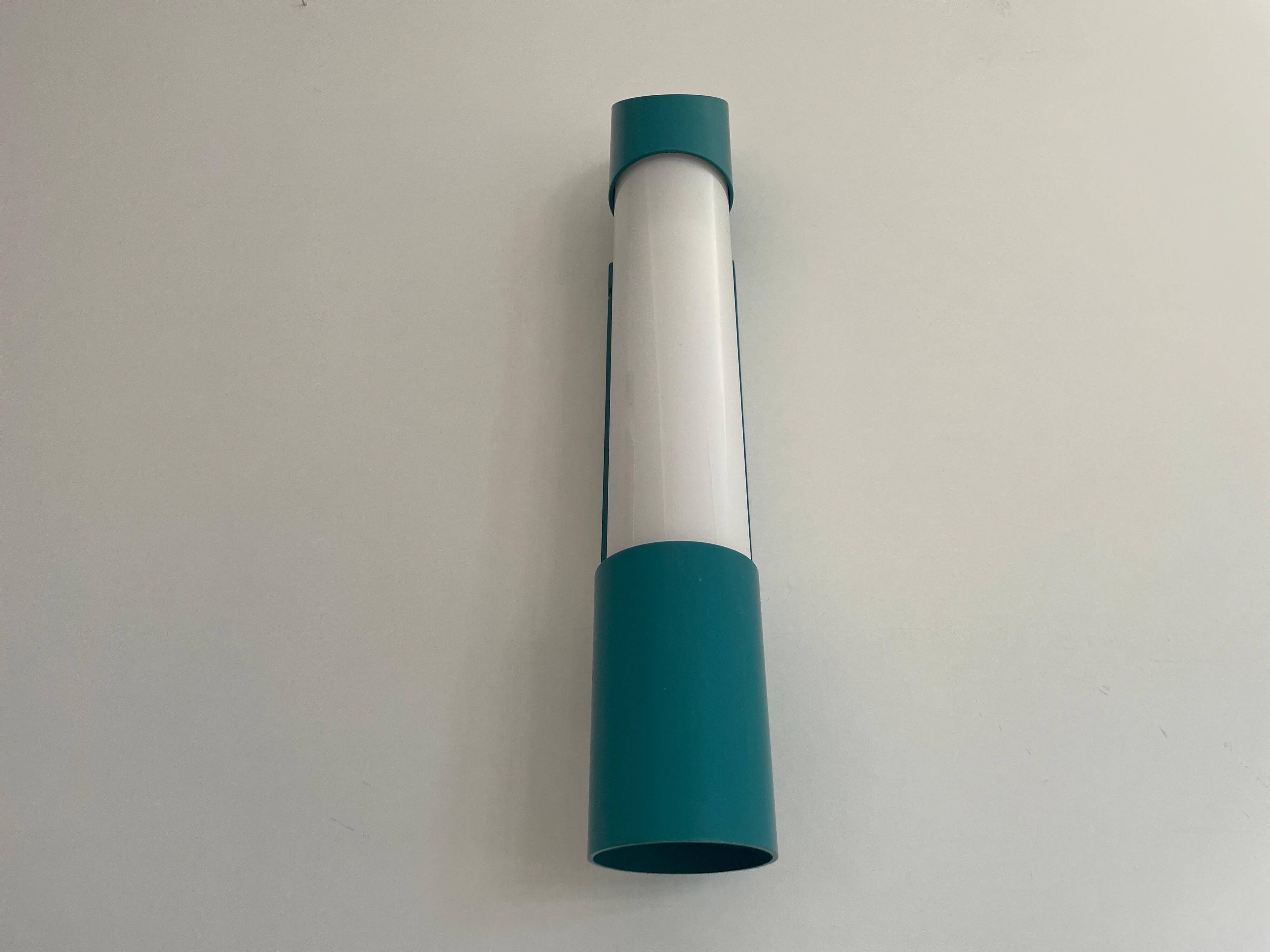 Simple cylindrical wall light in opal glass and turquoise metal, 1970s, Germany