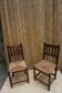 Pair of antique straw-seated farm chairs