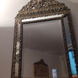 Repelled brass pareclose mirror