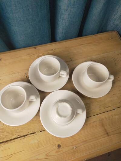 4 fours and 4 bistro coffee saucers