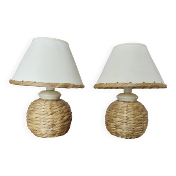 Pair of bedside lamps made of woven sea rush, matching lampshades, 1980.