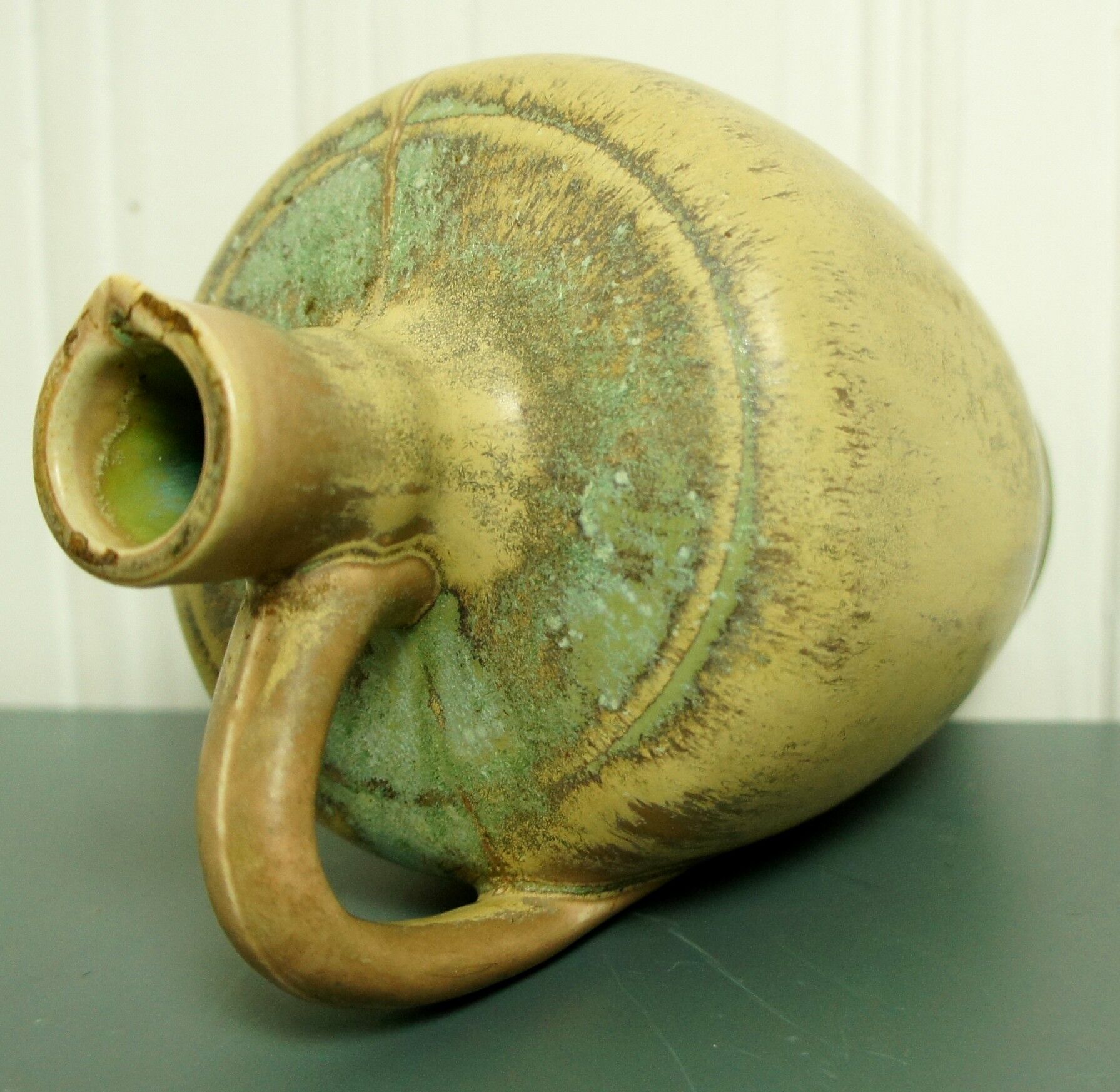 Glazed porcelain pitcher