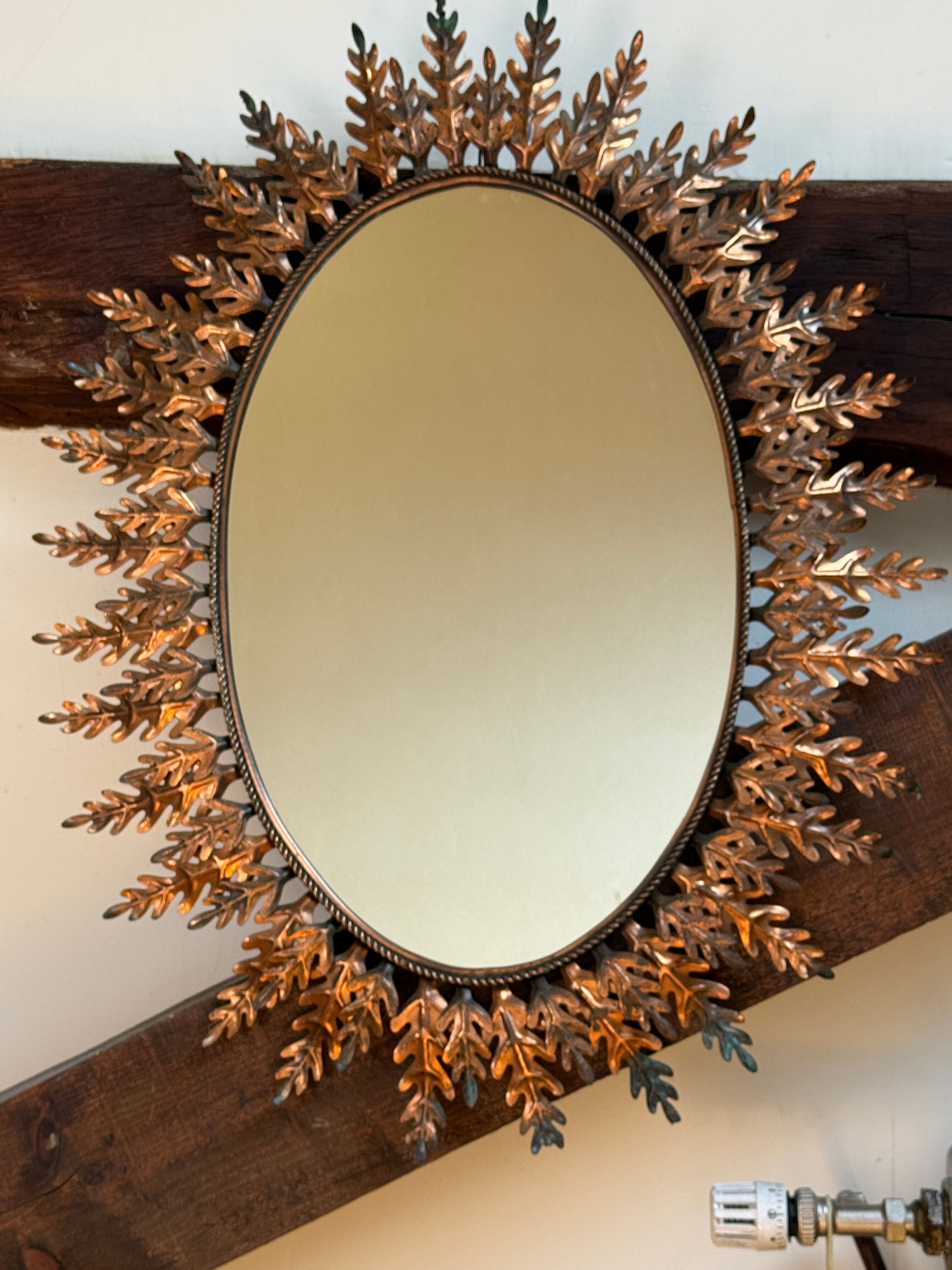 Oval sun mirror wrought iron from the 1950s Italy