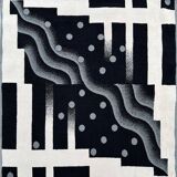 Tapis désigne