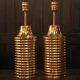 Pair of lamps in gilded brass