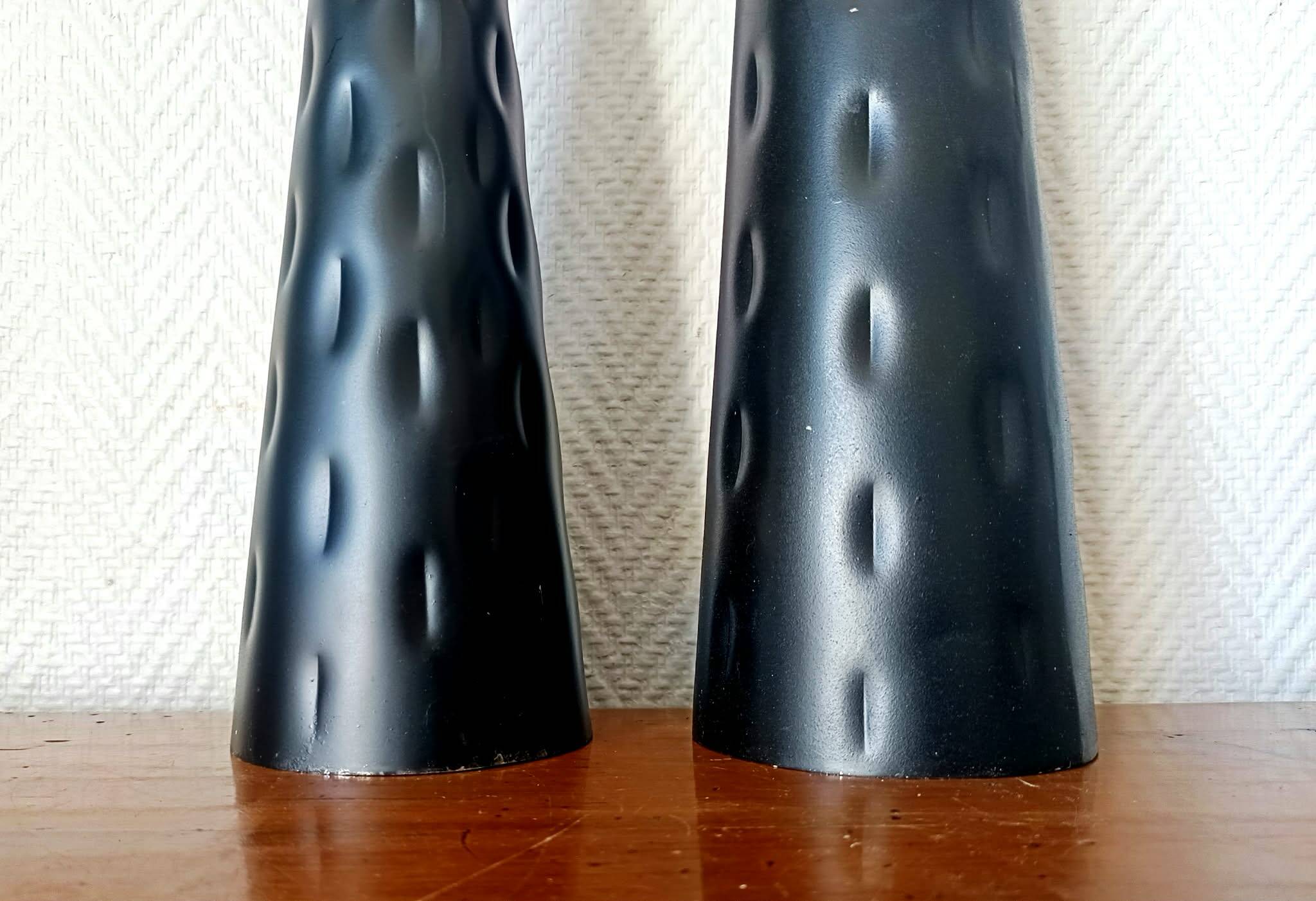 Pair of vintage metal diabolo candlesticks