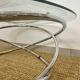 Coffee table with glass top and chrome tubular base