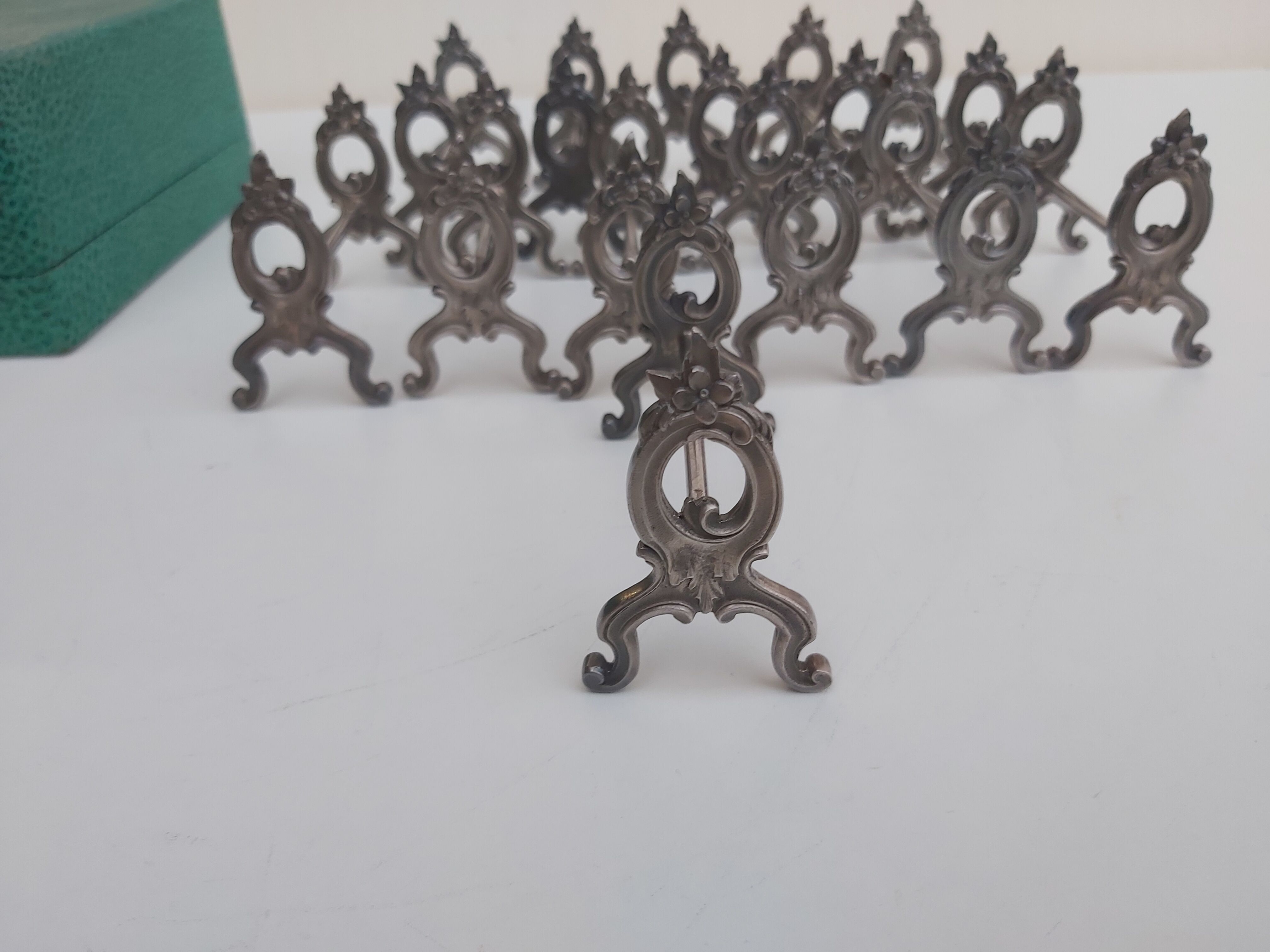 12 knife holders in their SFAM silver metal box