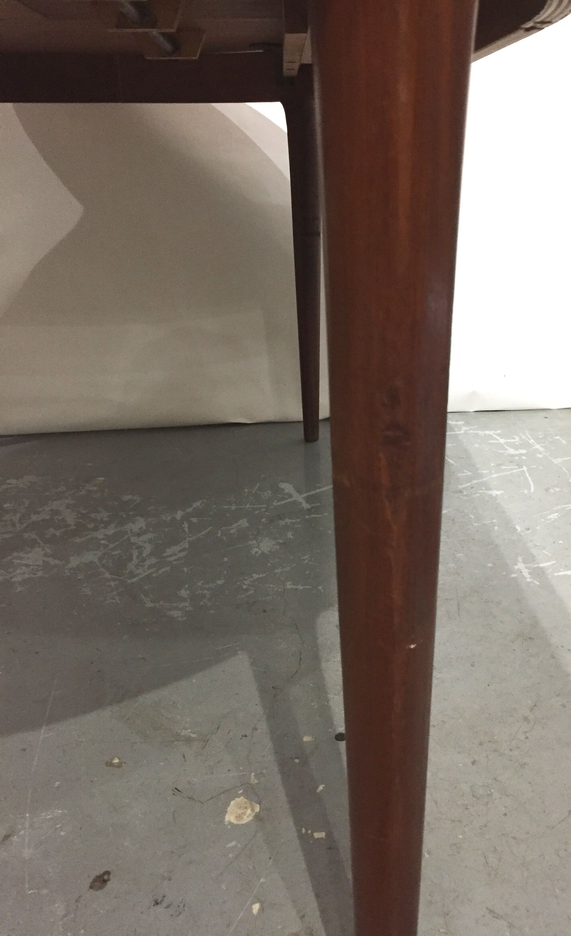 Scandinavian teak dining table with extension cords