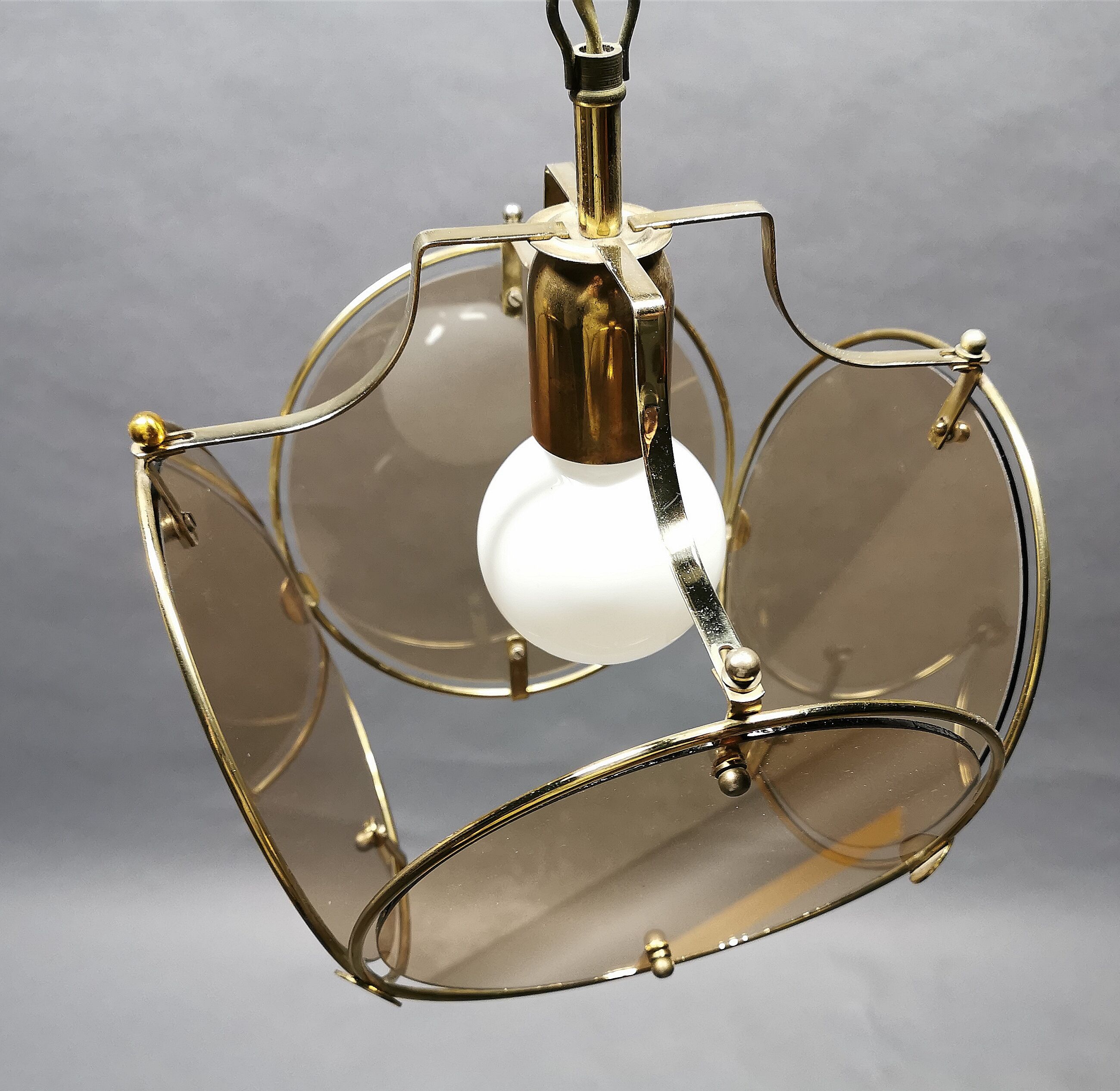 Suspension from the 70s in brass and brown smoked glass
