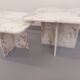 Pair of vintage nesting coffee tables in white marble from the 1970s.