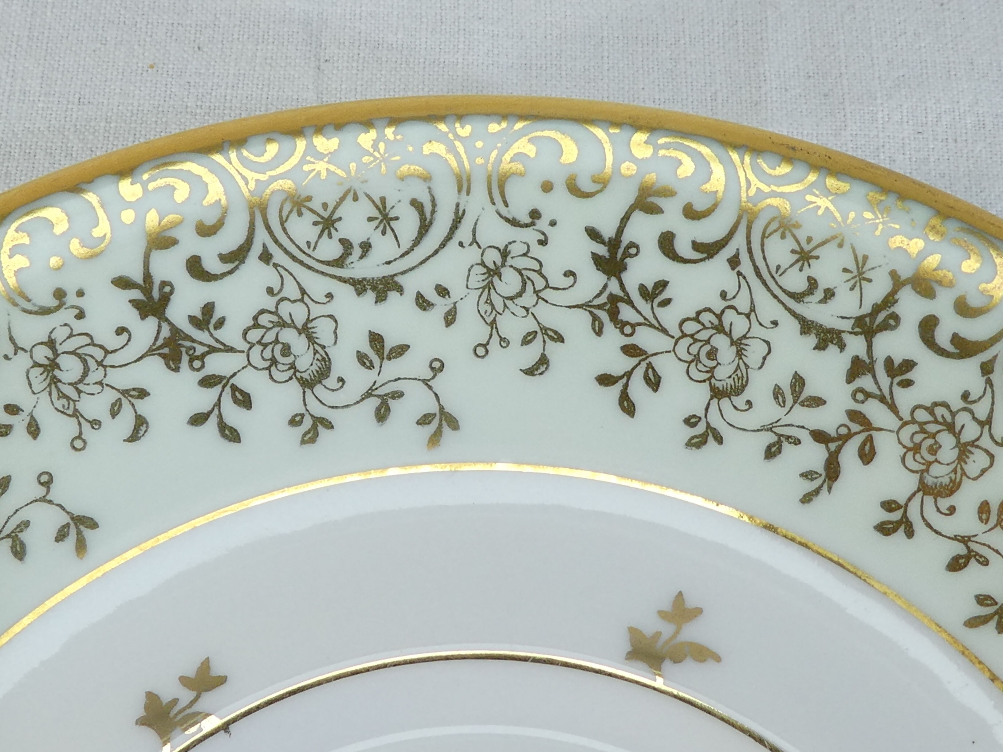 Green and gilded LIMOGES porcelain cup and cup lunch