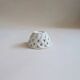 Woven ceramic pocket emptier – Spain