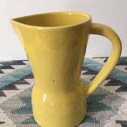 Pitcher or vase in yellow porcelain stamped Saint Clément France, numbered 7821