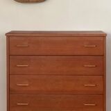 Vintage 1960s chest of drawers with covered handles.