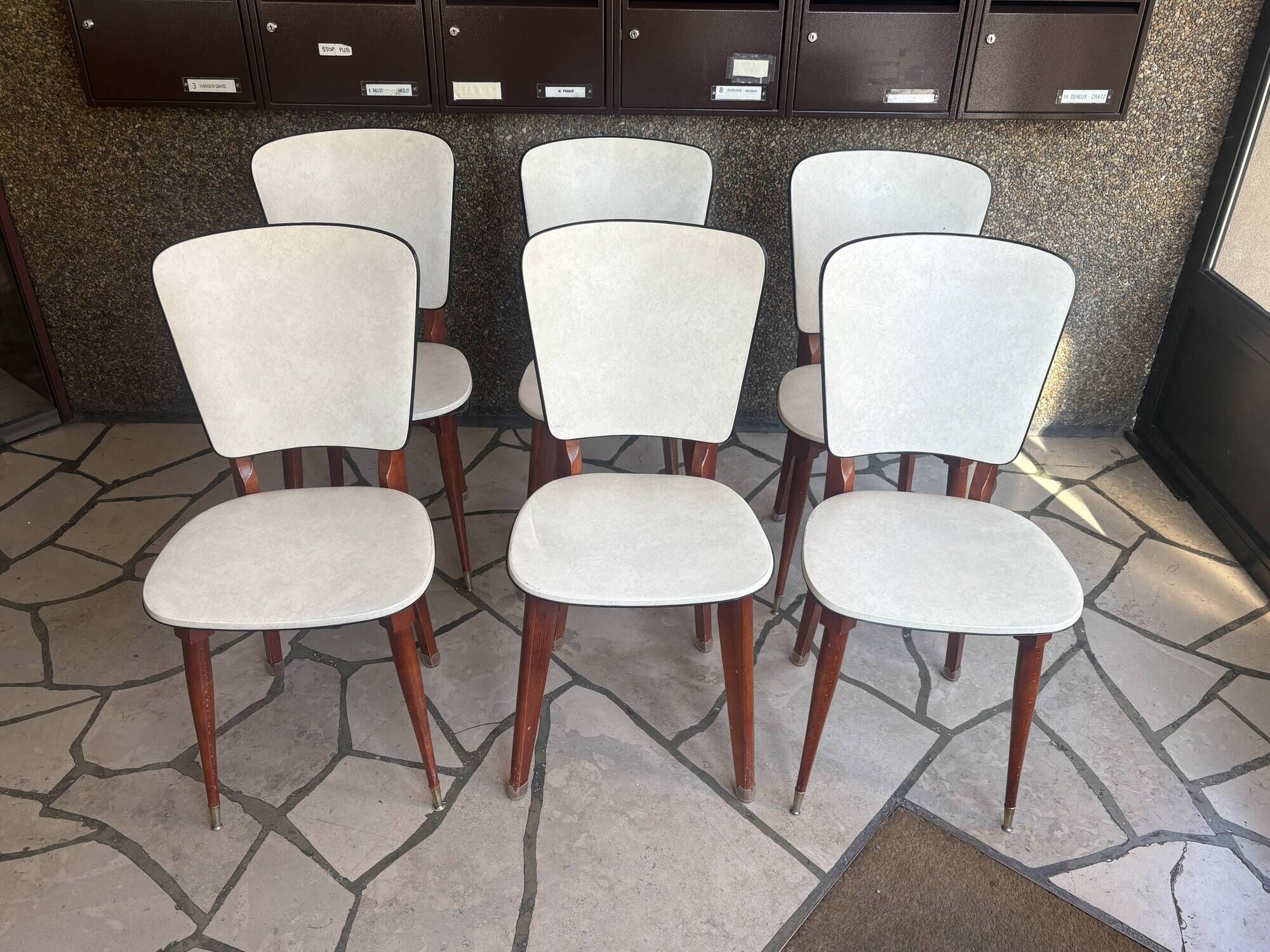Set of mid-century Scandinavian-inspired chairs.