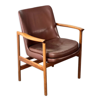 Fauteuil en cuir et bois de Ib Kofod Larsen