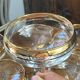 Champagne coupes or cocktail glasses with gilding