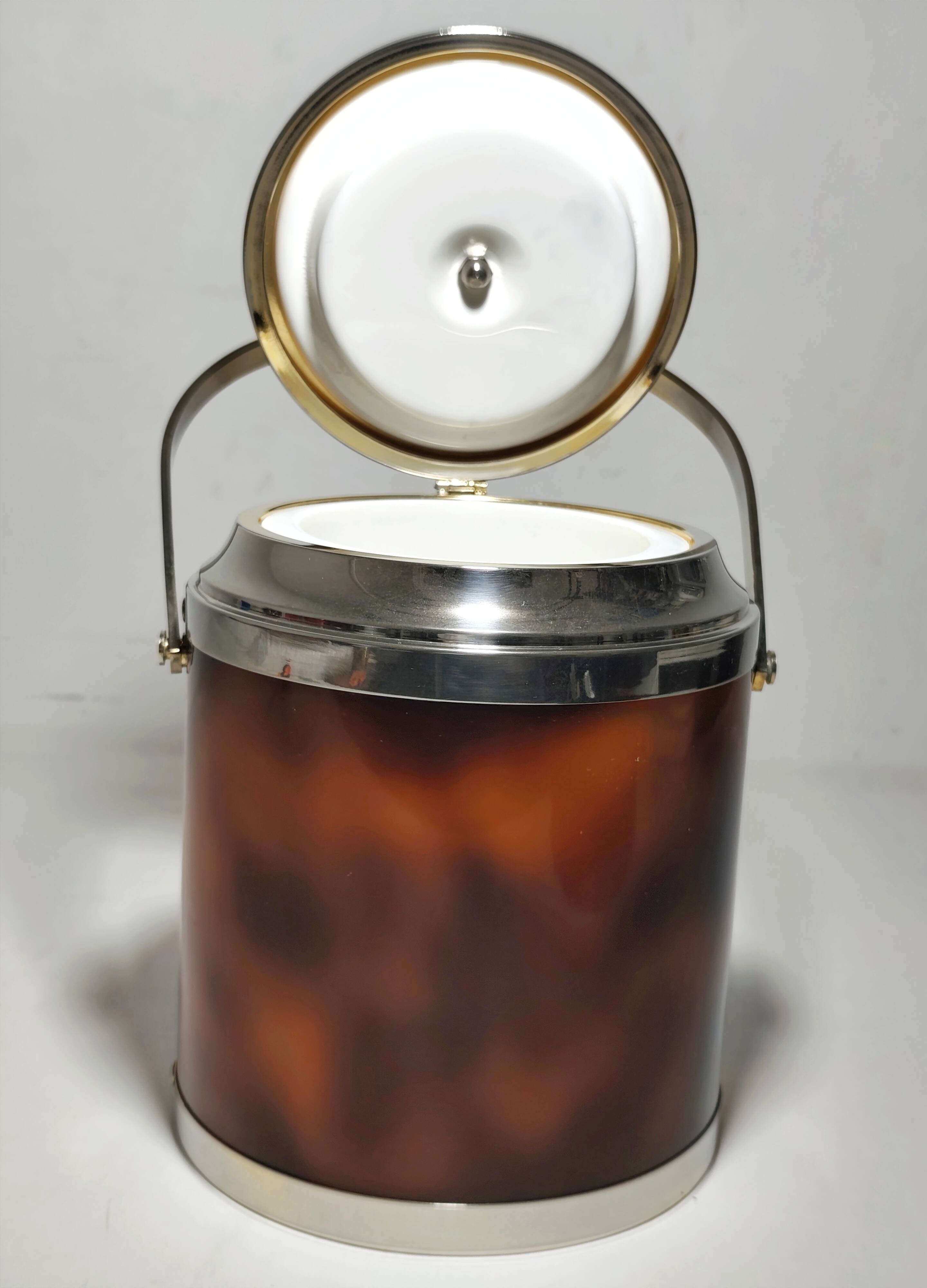 Acrylic and metal ice bucket. Spain, 1970s.