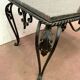 Table basse en fer forgé et marbre XX siècle