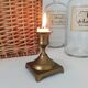 Vintage brass candle holder square base