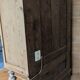 Former campaign secretary's desk in solid pine with a high cupboard.