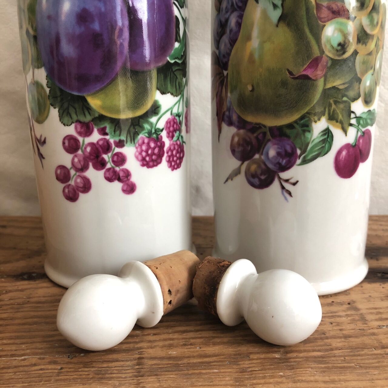 Porcelain bottle duo for mirabelle and raspberry brandy