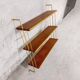 Vintage wall shelf in teak and golden brass String Tomado style