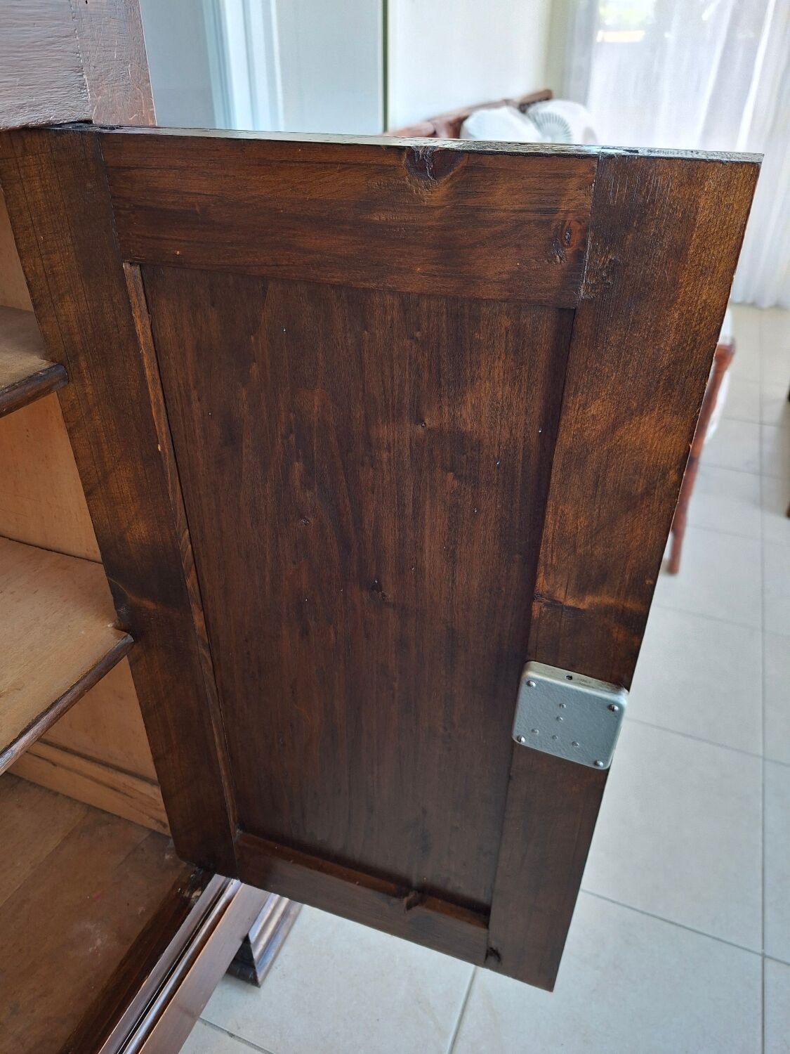 Small storage unit in solid wood and copper.