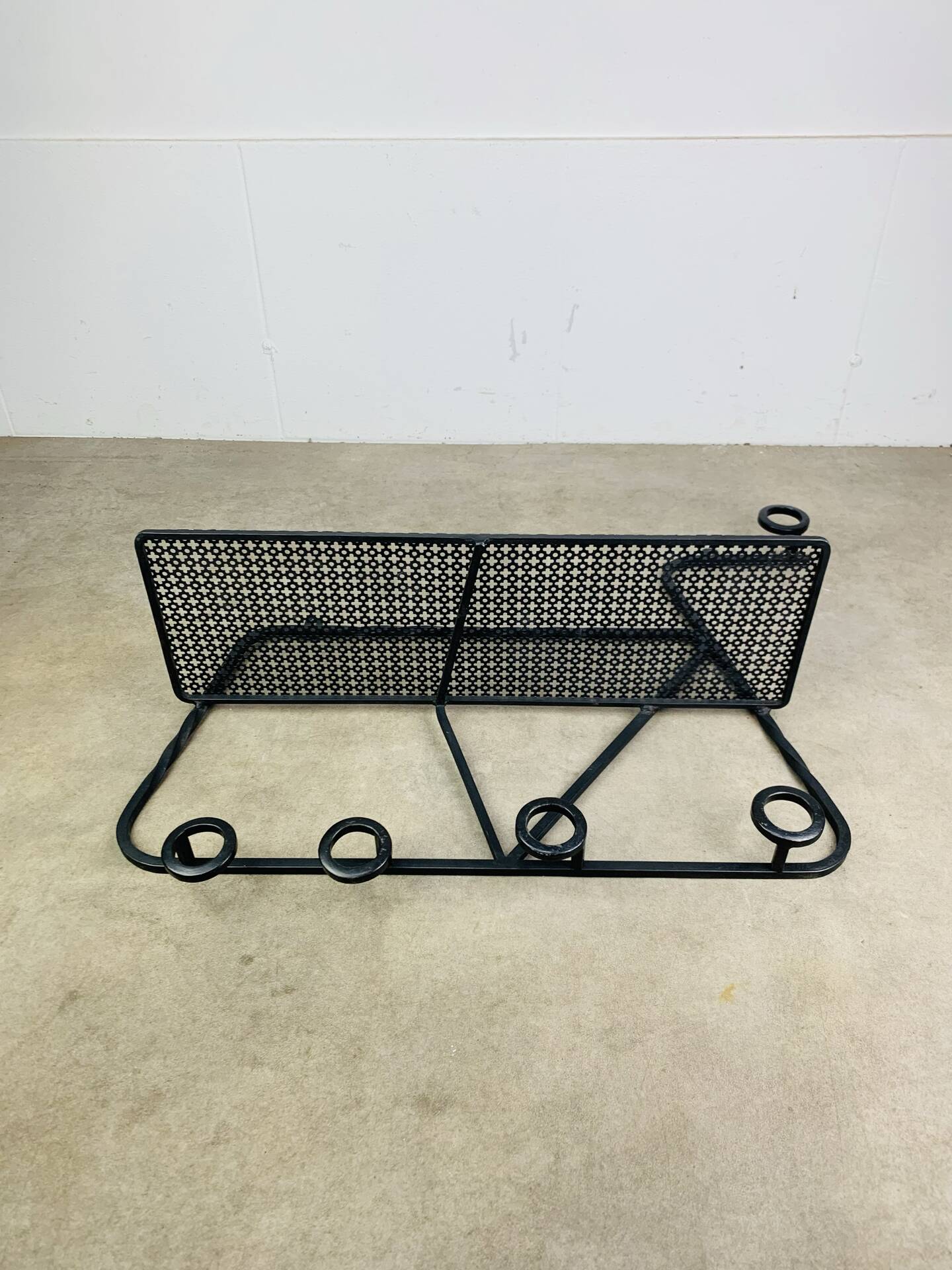 Wall-mounted coat rack/wardrobe from the 1950s, wrought iron and rigidule.