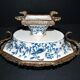Blue Chinese floral porcelain coupe on a bronze base table centrepiece.