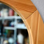 Vintage Scandinavian round wall mirror in solid pine from the 60s-70s.