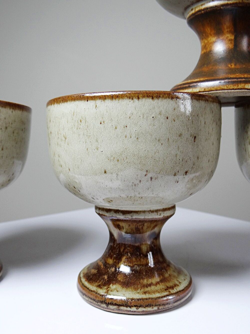 Set of 4 vintage glazed stoneware cider bowls/ice cream cups with stems.